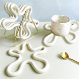 פלייסמנט מעוצב לסיר או מחבת